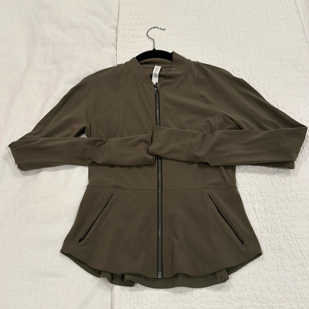 Lululemon; green athletic jacket